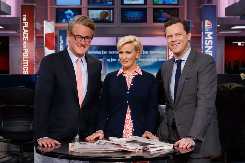 Joe Scarborough, Mika Brzezinski and Wlllie Geist On MSNBC’s “Morning Joe” set