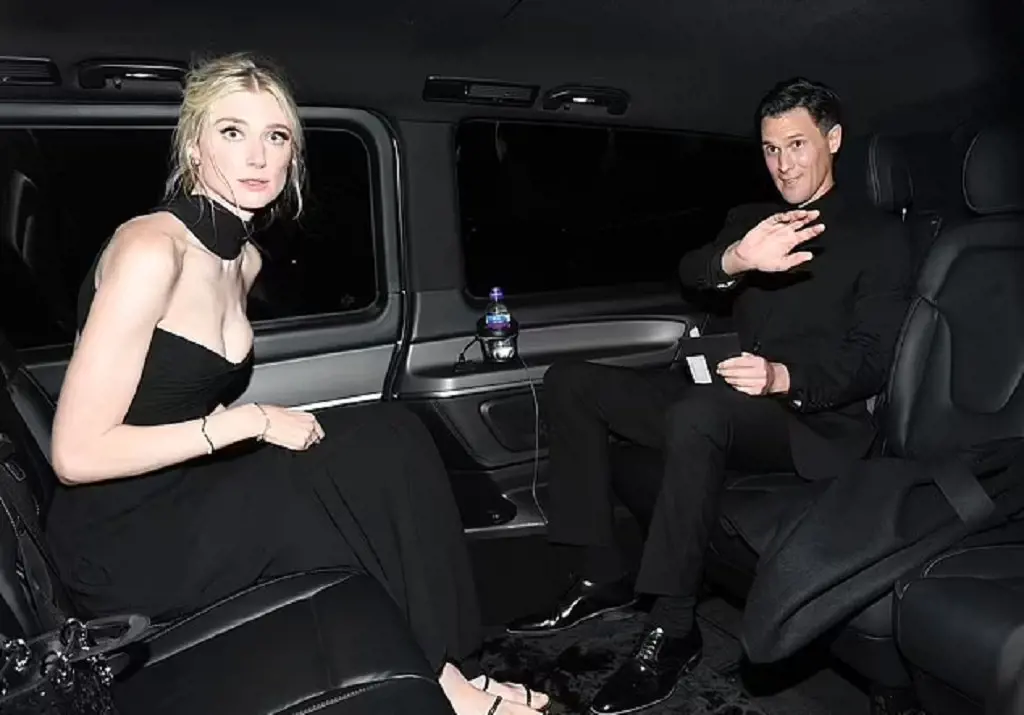 Elizabeth Debicki and Kristian Rasmussen leaving the event in the back seat of a Tuxedo