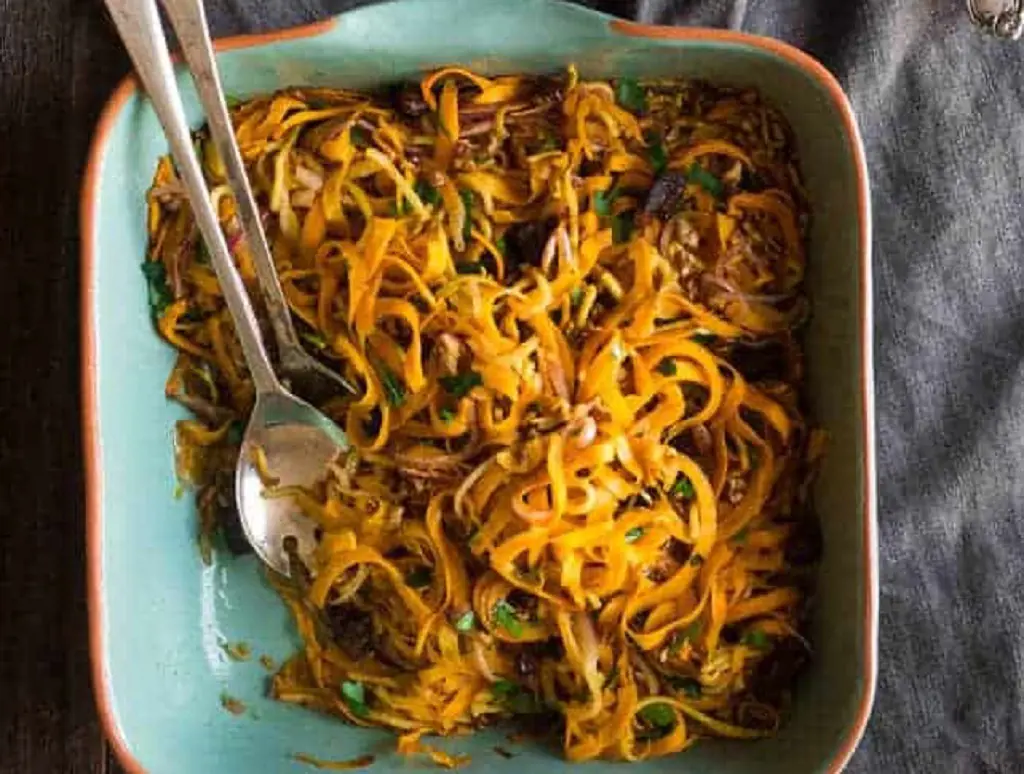 Curried butternut squash salad is full of apples, dates and pecans. 