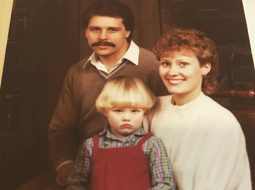 Sara Orlesky's childhood picture with her mother and father