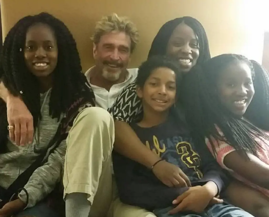 John McAfee And His Step-Children With Janice Dyson