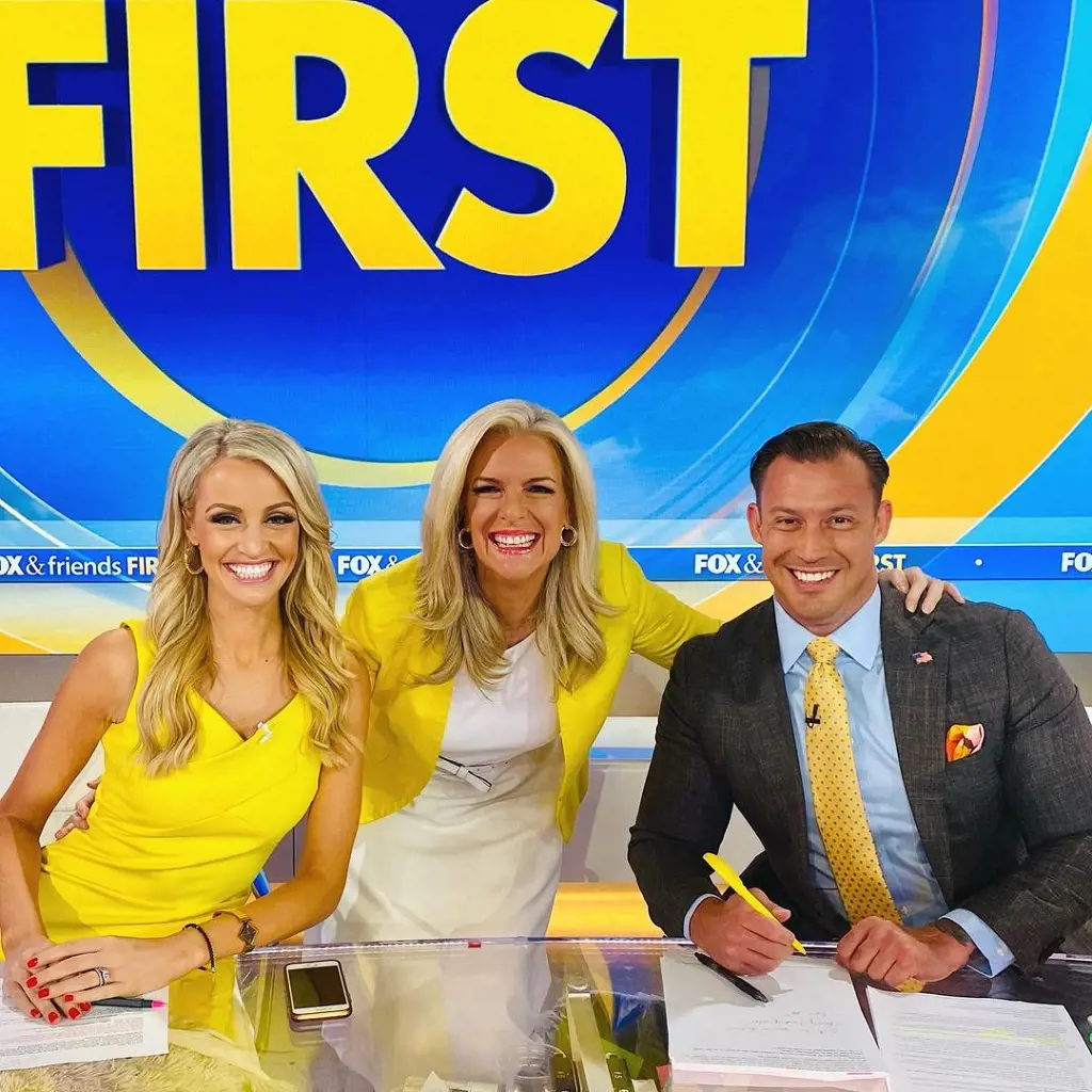 Carley Shimkus with her coworkers at FOX News