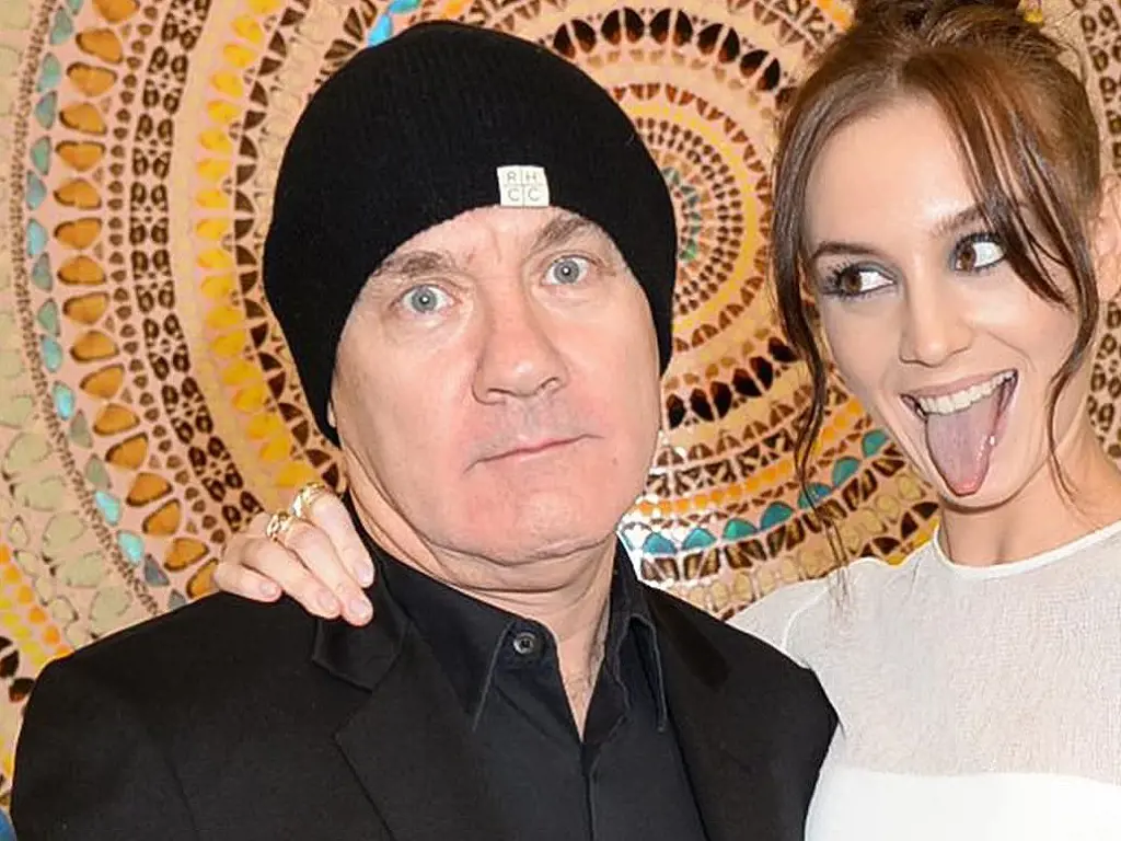 Damien Hirst along with his 27 year old girlfriend, Sophie.