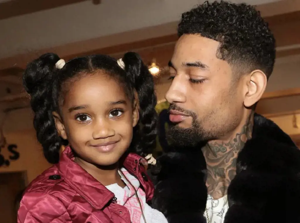 Pnb Rock with his nine-year-old daughter Milan Allen