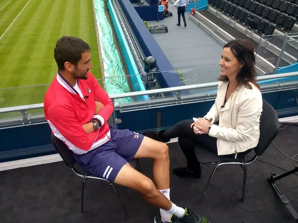 Lee Mckenzie interviewing British Tennis player Cameron Norrie during her coverage of Wimbledon