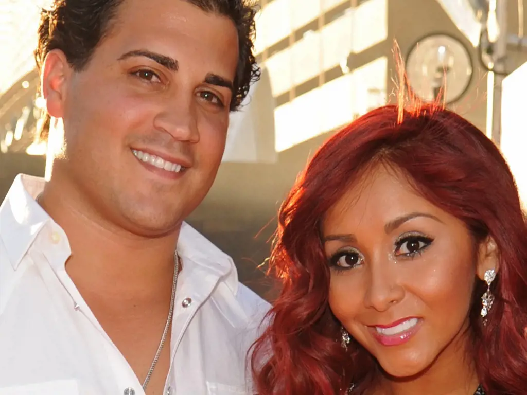 Snooki along with her husband, Jionni who see met through her reality show