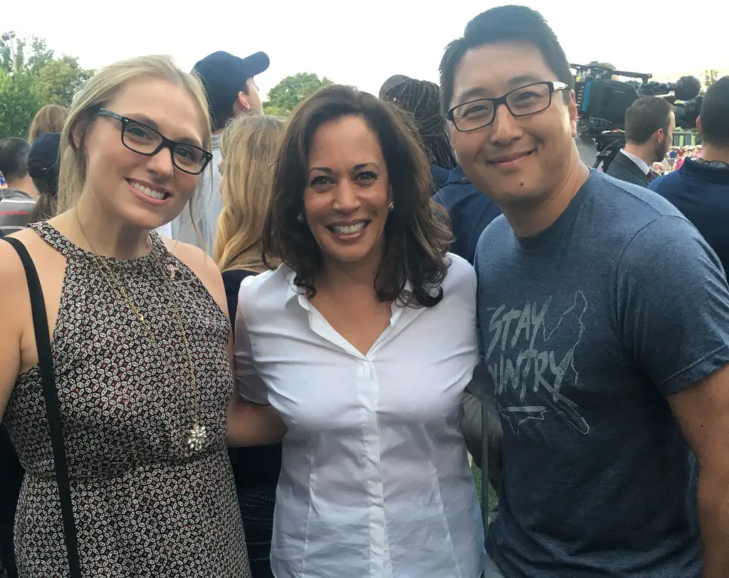 Kurt Bardella And His Wife Miroslava Korenha On A Picture At 2018 Congressional Women's Softball Game With Next To Vice President of The United States Kamala Harris