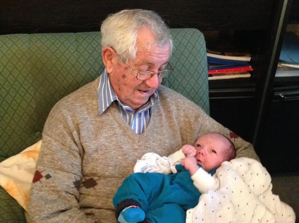 Jessica Fostekew grandfather holding her grandson six years ago on November 20
