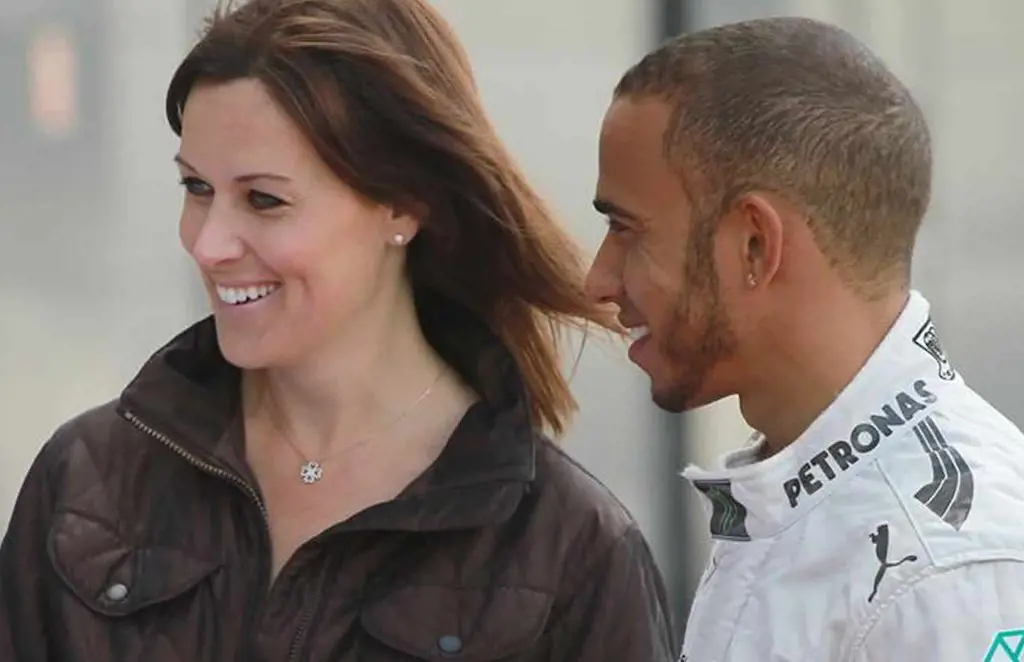Lee Mckenzie with lewis Hamilton during one of the F1 events.
