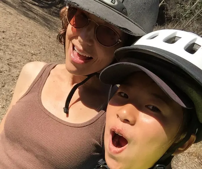 Cathy and Milan in 2015 while they were out horseback riding