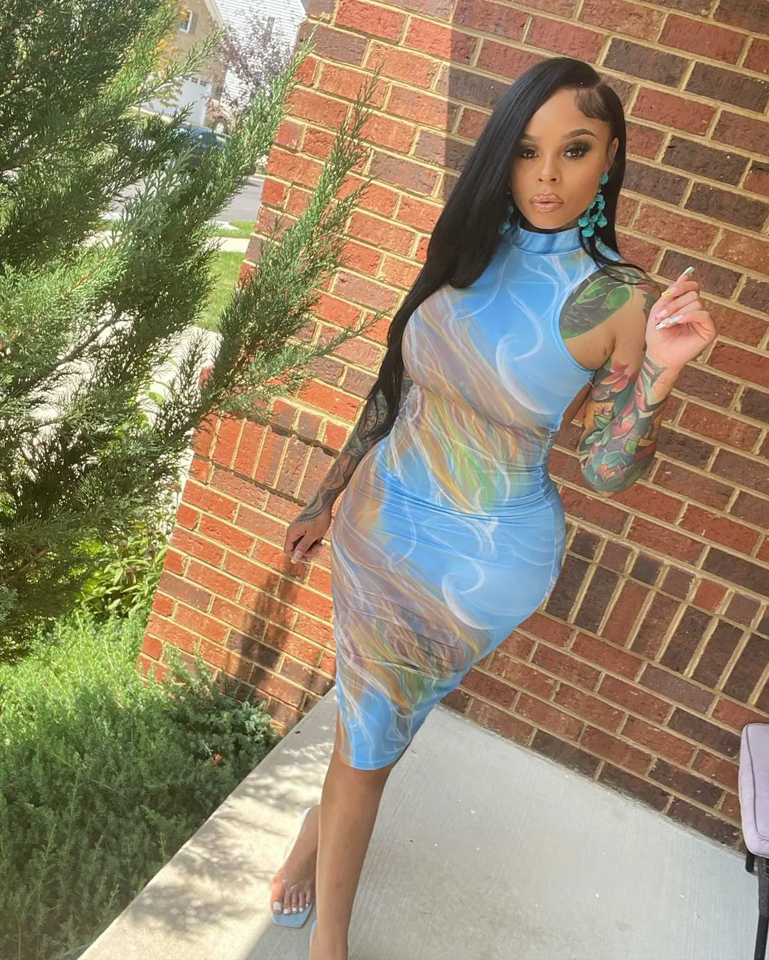 Razor modeled for her clothing brand, flourishing her look with the new arrival Sky. The dress sold out in MajorCollectionsBoutique for $15.