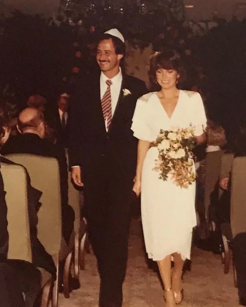 The realtor's parents on their wedding day; he shared this photo on October 11, 2019, marking their anniversary