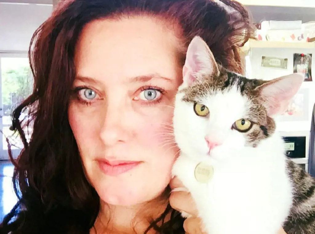 Matthew's partner Leslie with her cat in 2017