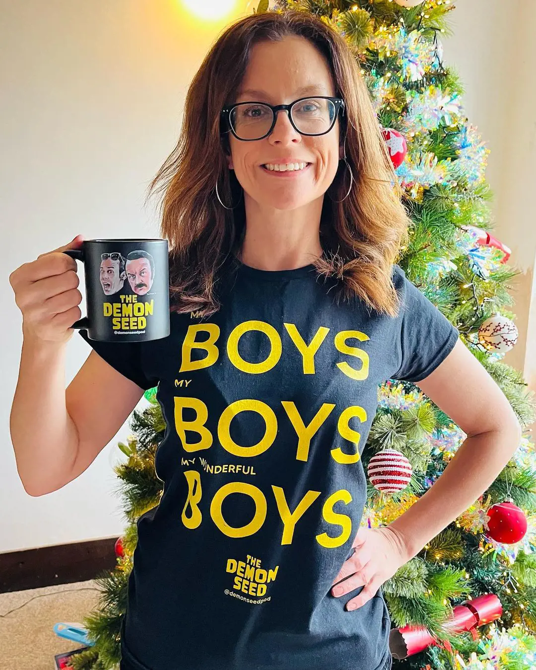 Kelly wore the Demon Seed Pod march dress and drank in the podcast cup to show her support for her husband. She even loved the mug and the dress, not their podcast. 