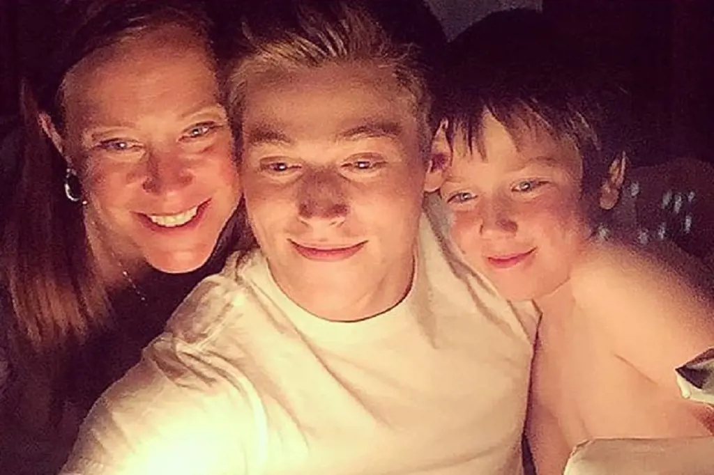 Froy Gutierrez with his mother and little brother