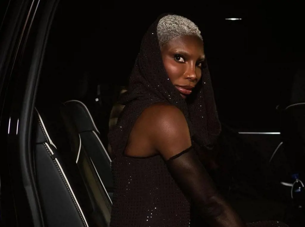Michaela Coel prepares to set foot on the red carpet, for the Walt Disney Pictures movie world premiere in Los Angeles