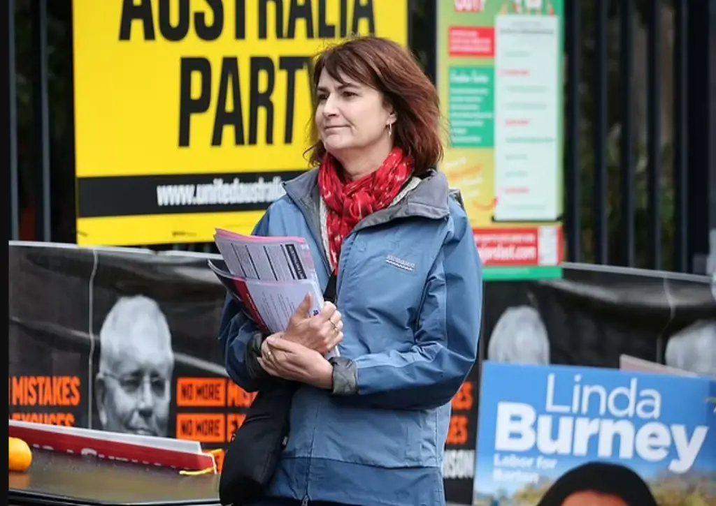 Carmel Tebbutt handing out flyers of her ex-husband Anthony Albanese's election campaign