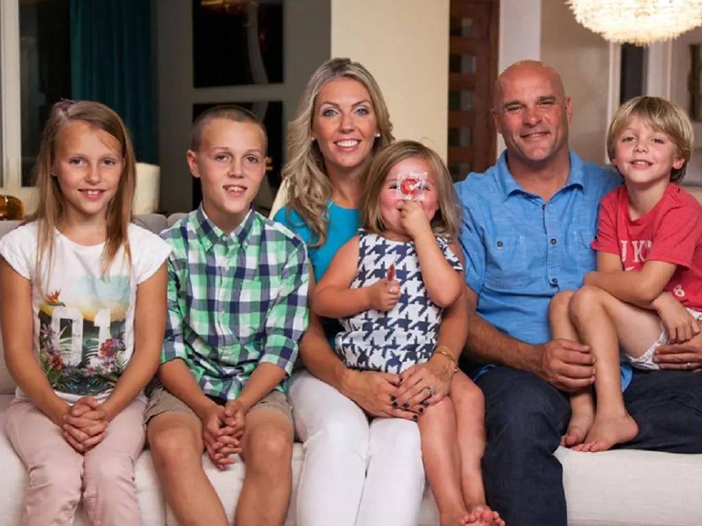 Family picture of Bryan Baeumler with his wife and four children