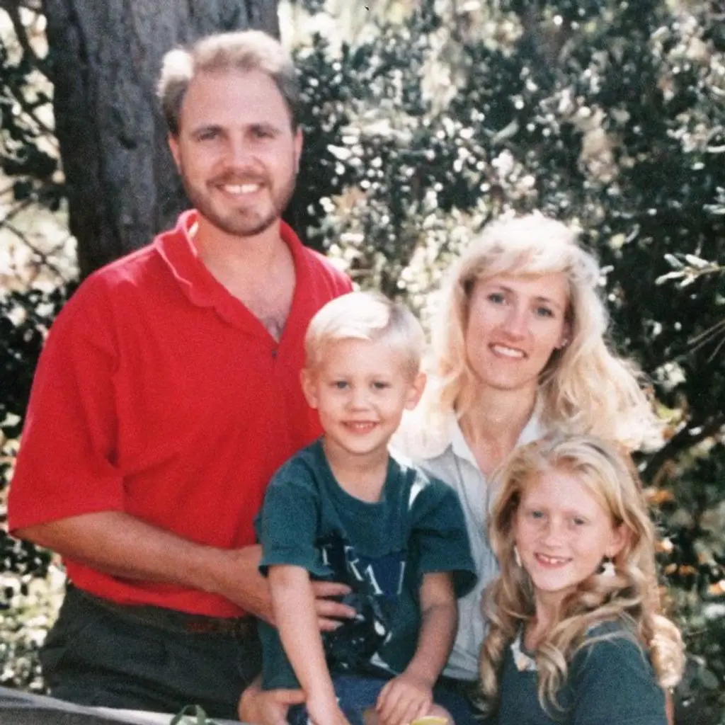 Austin Butler and his sister Ashley in this old photograph with their parents while they were kids. 