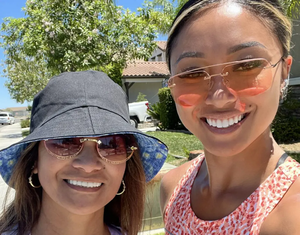 American Golfer Tsha Alyn With Her Mother 