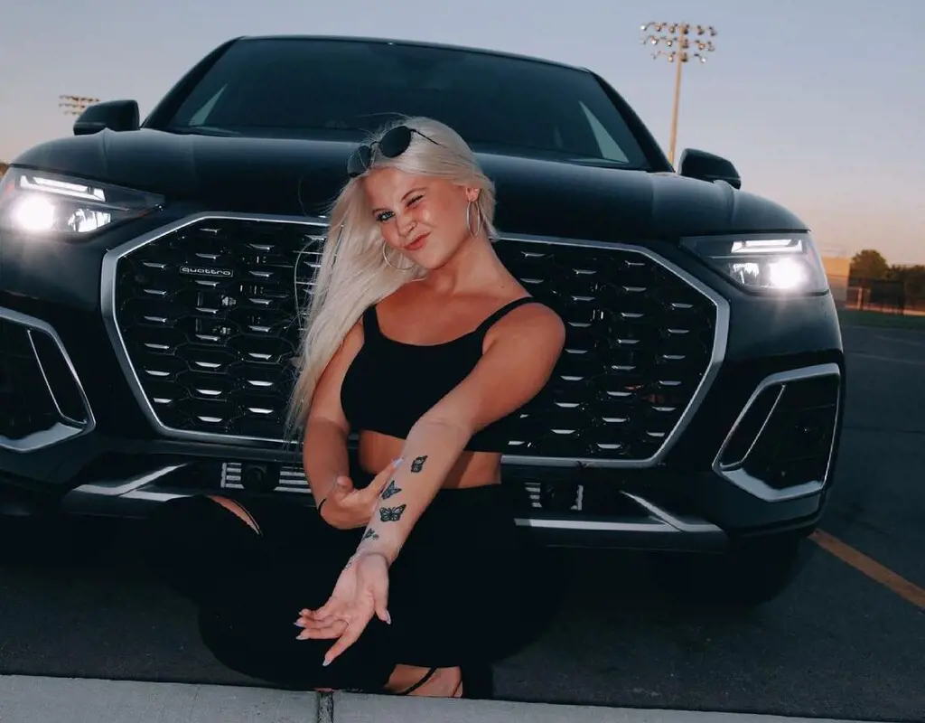 Tiktok star Christen Whitman showing off her newly bought Audi, she looks happy