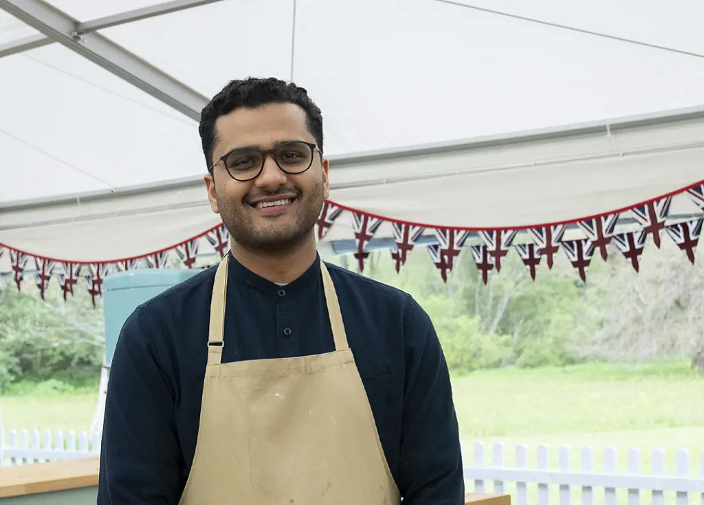 Abdul, a contestant in the Great British Bake Off, is a Cake Week Showstopper