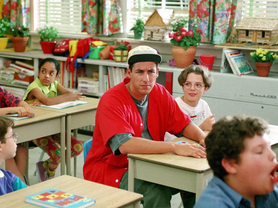In Billy Madison, Sandler's character Billy must complete all 12 grades of school, with two weeks for each grade, to prove he is competent