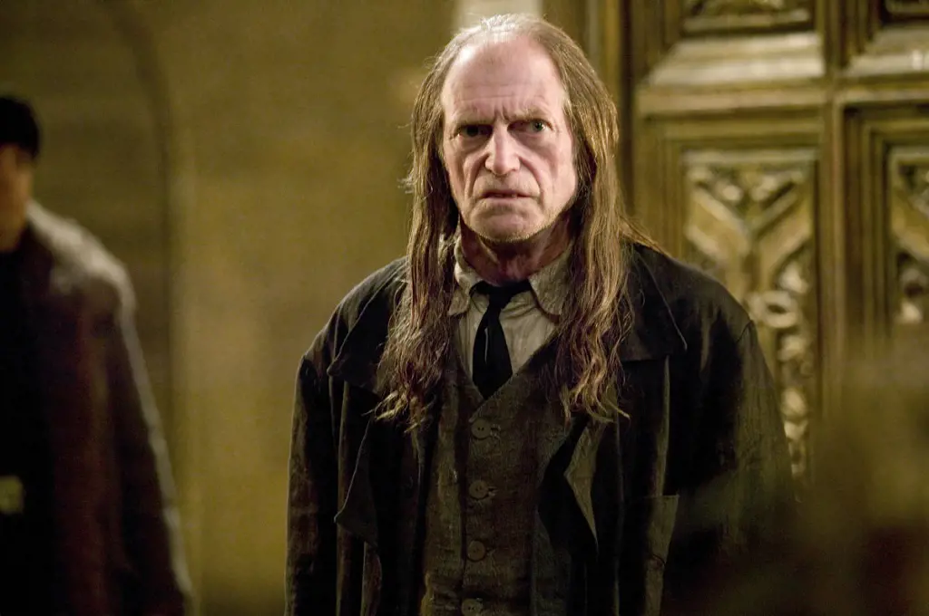 Argus Filch is Hogwarts' caretaker who punishes rule-breakers.