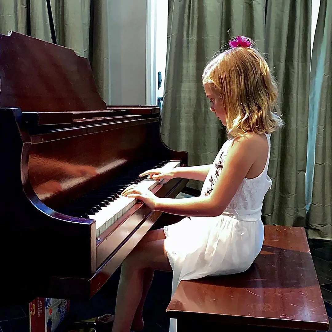 Olivia playing the piano in April 2020