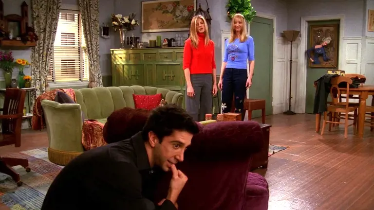 Ross tries to attack Rachel and Phoebe