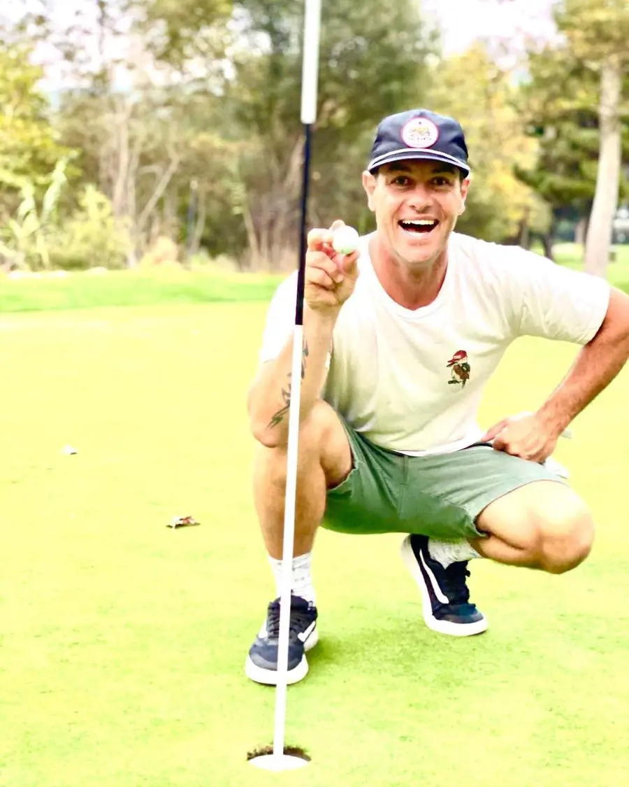 The renovator having a wonderful time playing golf in The Ranch at Laguna Beach; the picture showing his arm tattoo partially